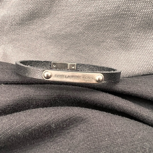 BRACELET WITH A SAINT LAURENT-ENGRAVED PLAQUE AND MAGNETIC FASTENING. - Picture 3 of 5